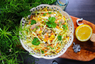 Salad with canned fish, corn and eggs