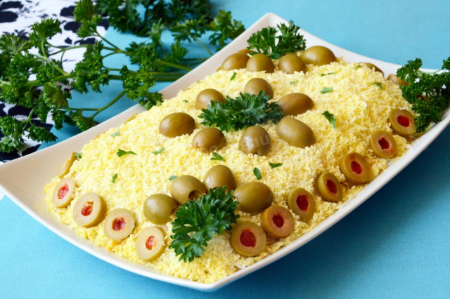 Classic layered salad with cod liver