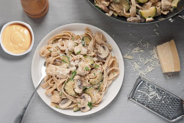 Pasta with mushrooms and chicken in cream sauce