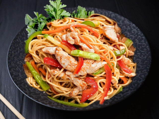 Wok noodles in sweet and sour sauce
