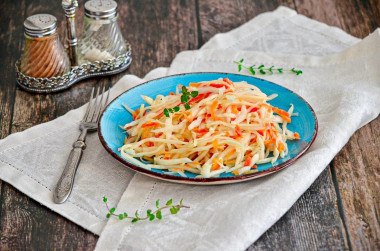 Fresh cabbage salad with carrots as in the dining room with vinegar