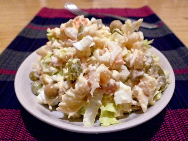 Salad with Peking cabbage and chicken breast and celery