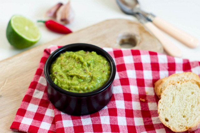 Guacamole sauce with garlic and red onion