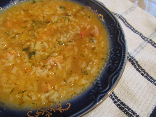 Rice tomato soup with garlic and herbs