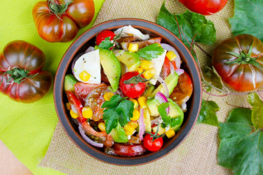 Avocado salad with corn and tomatoes