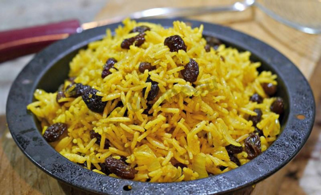 Basmati rice with raisins and spices in Indian style