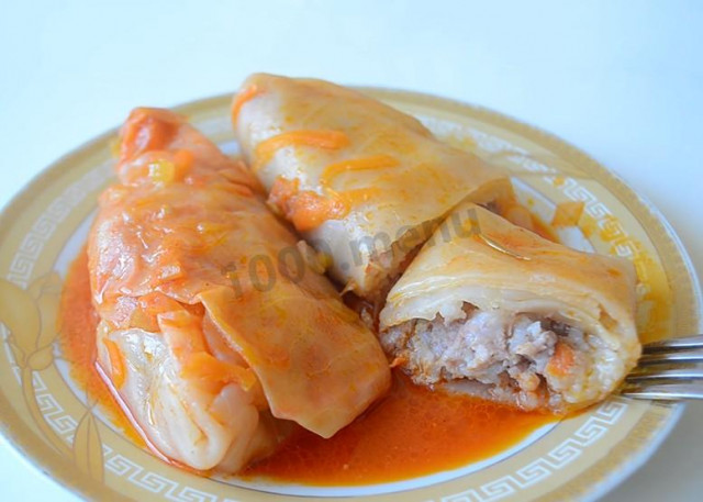 Cabbage rolls with tomato paste and garlic from young cabbage