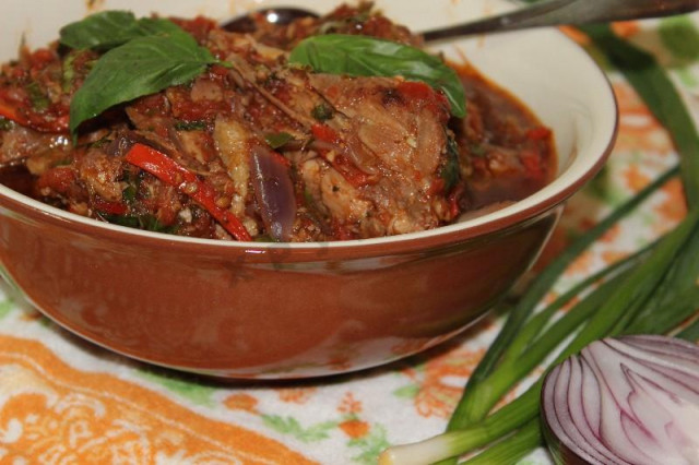 Chakhokhbili with tomatoes in a frying pan
