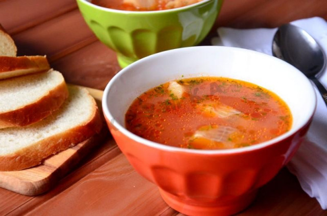 Tomato soup with fish and corn