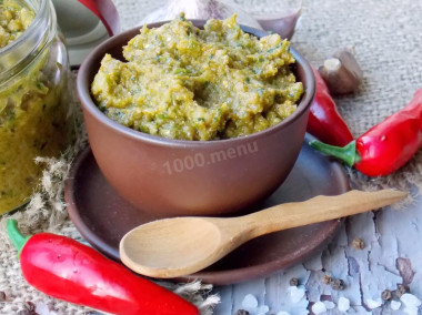Adjika of hot green pepper with garlic and spices