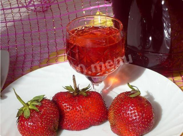 Strawberries with leaves on vodka with with water