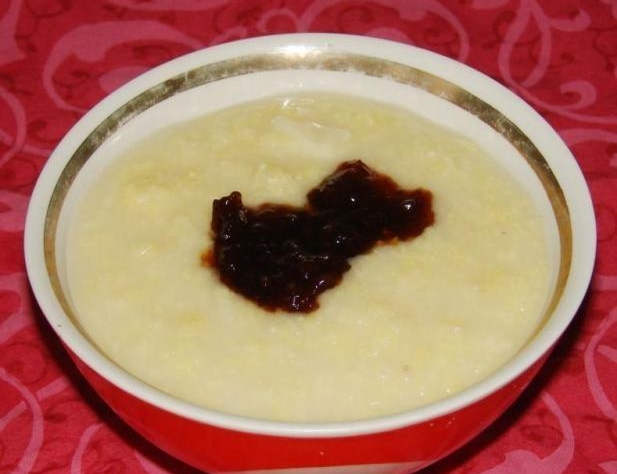 Liquid millet porridge with raspberries