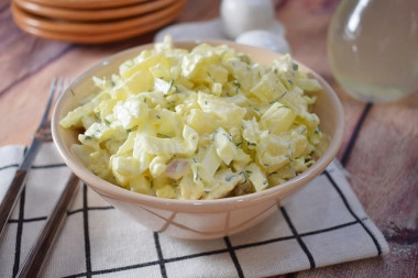 Salad with smoked chicken, Peking cabbage and pineapples