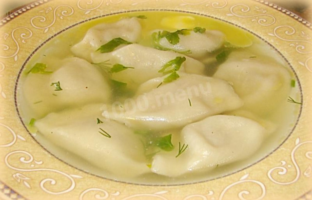 Soup with dumplings and roots