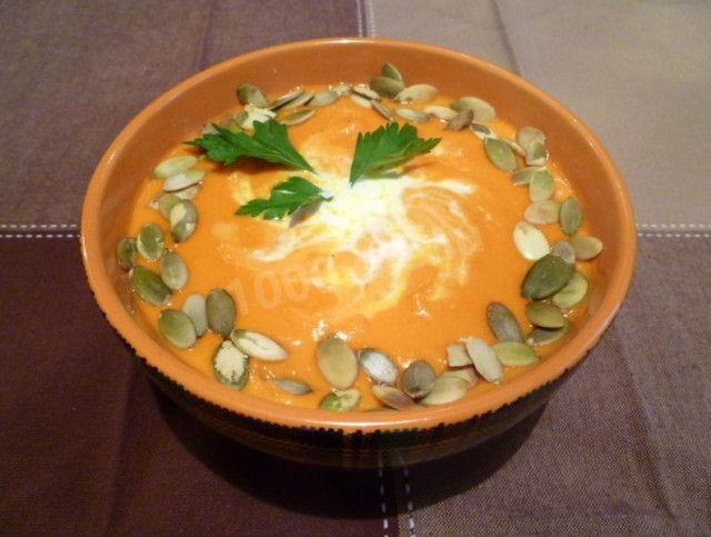 Pumpkin puree soup with cream and cheese