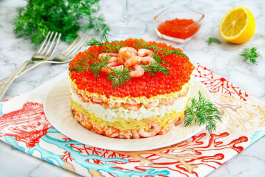 Salad with shrimp and red caviar