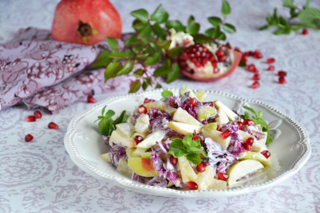 Fruit salad with Peking cabbage, apples and pomegranates