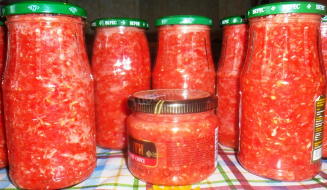 Raw adjika with horseradish and tomatoes for winter