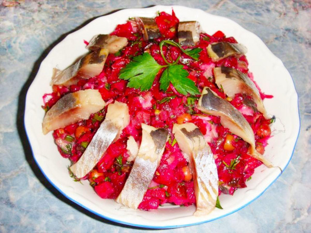 Delicious vinaigrette with herring, green onion and cabbage