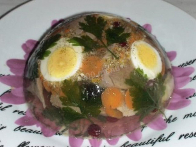 Beef tongue aspic with boiled egg and olives
