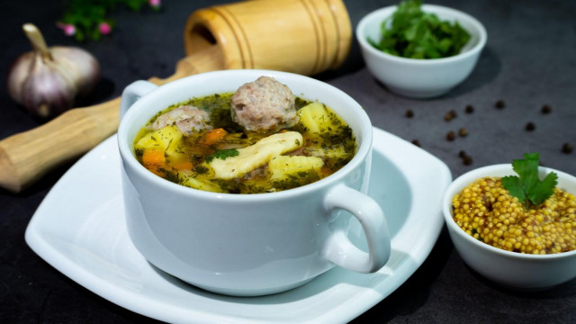 Soup with meat meatballs and dumplings