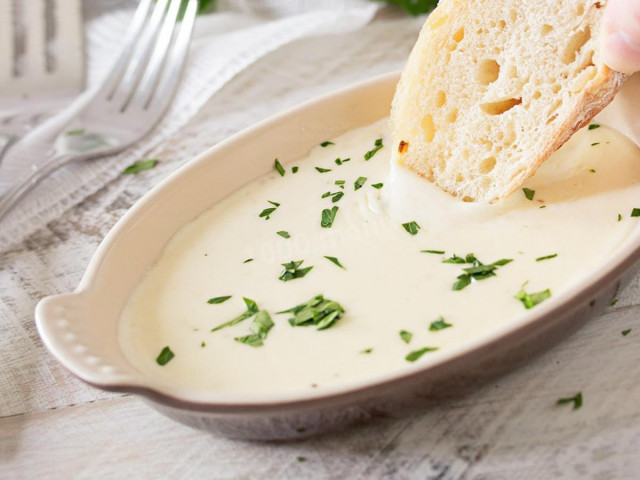 Cheese and garlic sauce in butter