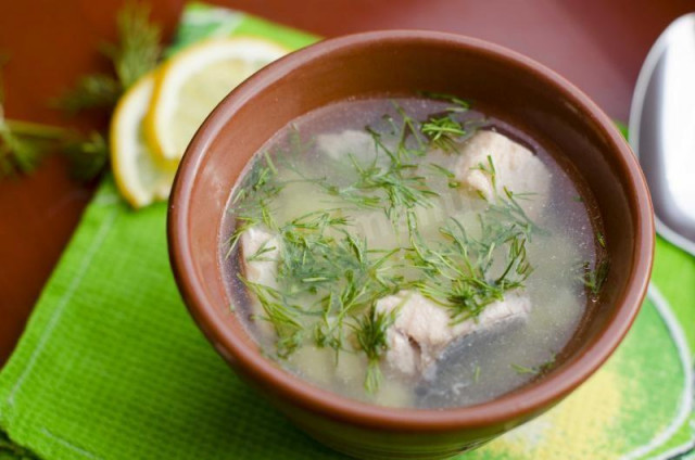 Salmon ear fish soup with potatoes and dill