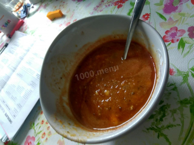 Tomato soup with mashed vegetables and roots in a slow cooker