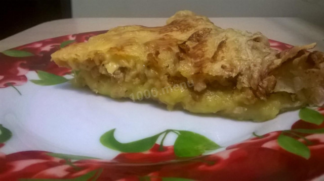 Potato casserole with minced meat on puff pastry
