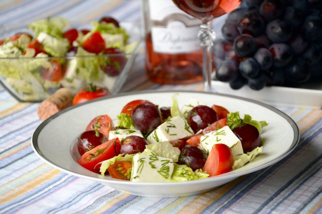 Vegetable salad with feta and grapes