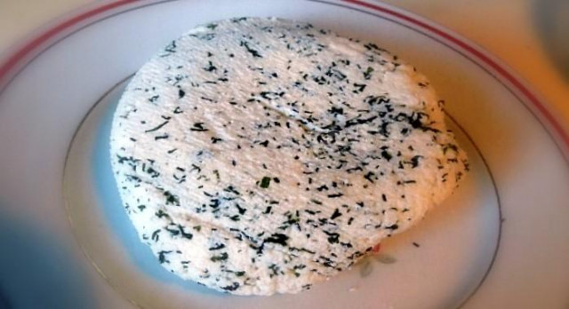 Homemade cheese with herbs
