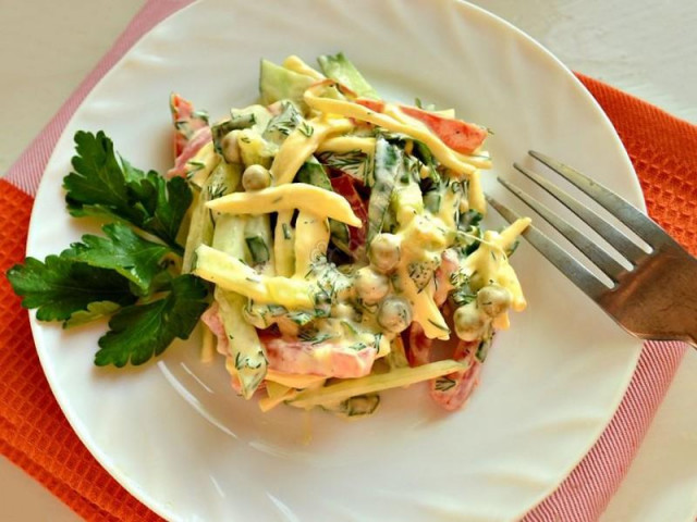 Salad with pigtail cheese and tomatoes