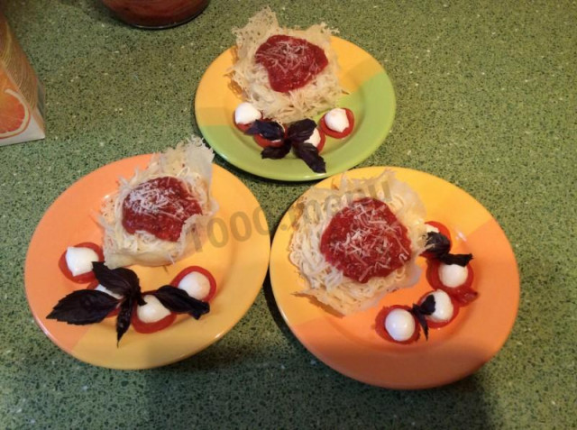 Cheese baskets with pasta and bolognese sauce