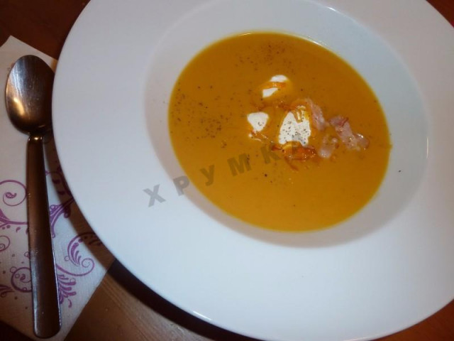 Pumpkin tomato and seafood soup