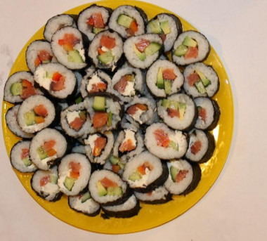 Homemade rolls and nigiri sushi