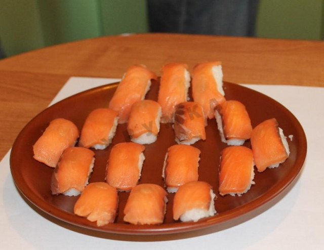 Homemade rolls and nigiri sushi