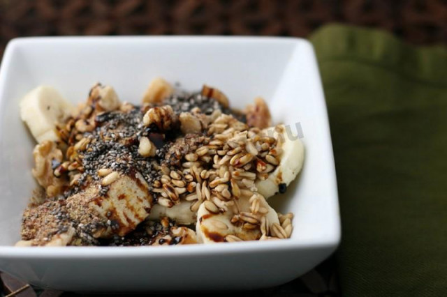 Sprouted oats with bananas, nuts and maple syrup