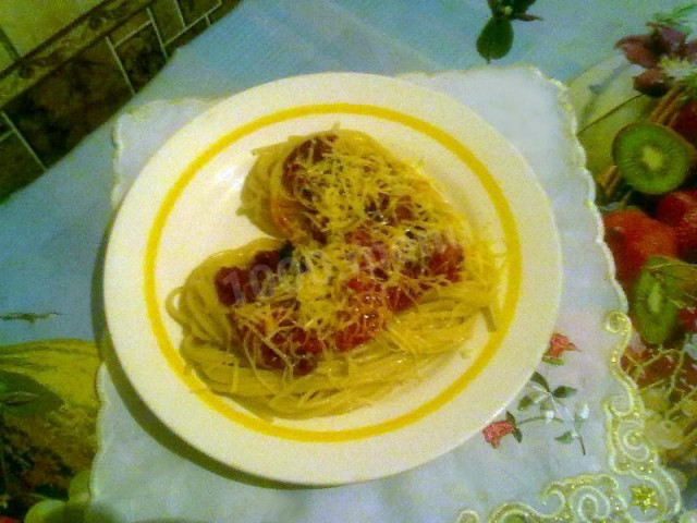Spaghetti with cheese tomatoes and eggplant