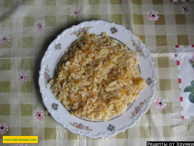 Side dish of rice with carrots and onions
