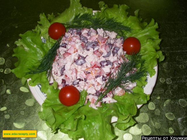 Red bell pepper salad with crab sticks and cheese
