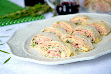 Pita bread roll with ham and cheese