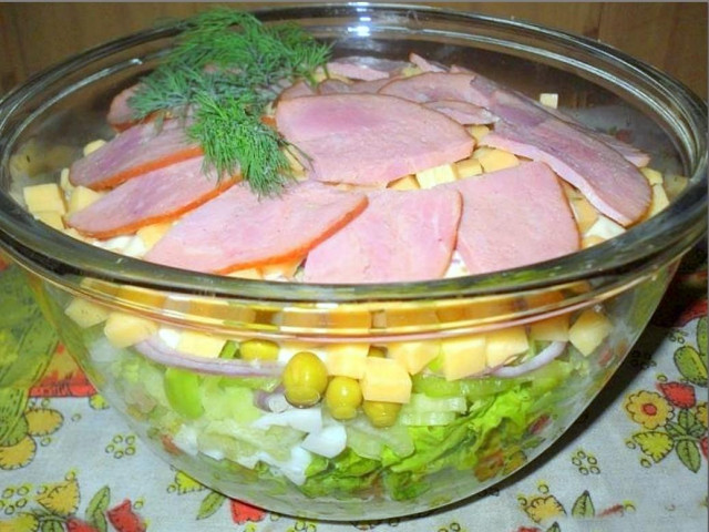 Light salad with bacon and mayonnaise layers