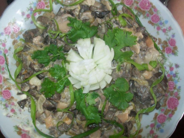 Beef liver salad with champignons