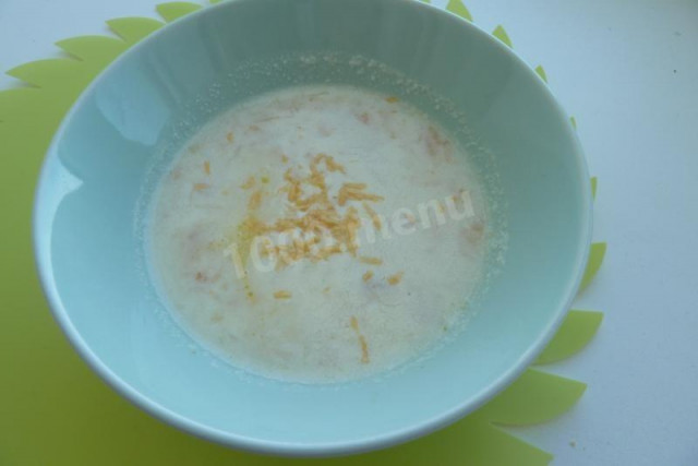 Celery puree soup with hard cheese and sour cream