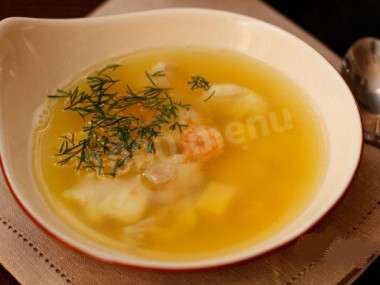 Broth with scrambled eggs and cheese