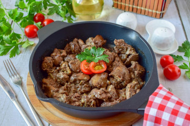 Chicken liver in a pan fried with onions