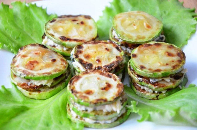 Fried zucchini with cheese and garlic