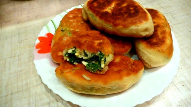 Fried pies with rice, egg and green onion