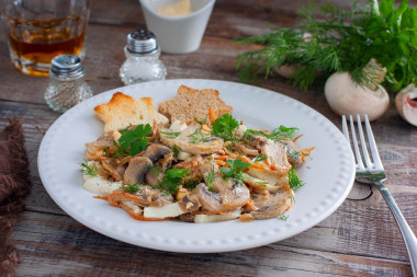 Salad with fried mushrooms, carrots and onions