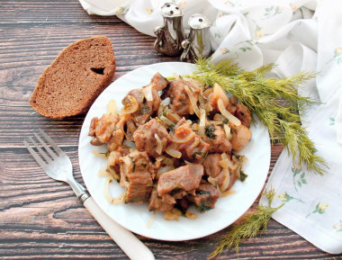 Pork fried in pieces in a frying pan